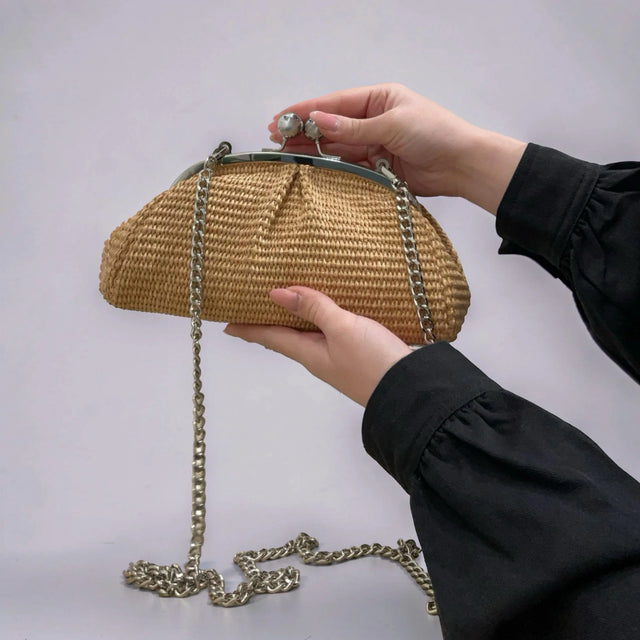 Leather and raffia bag with Meloro clasp.